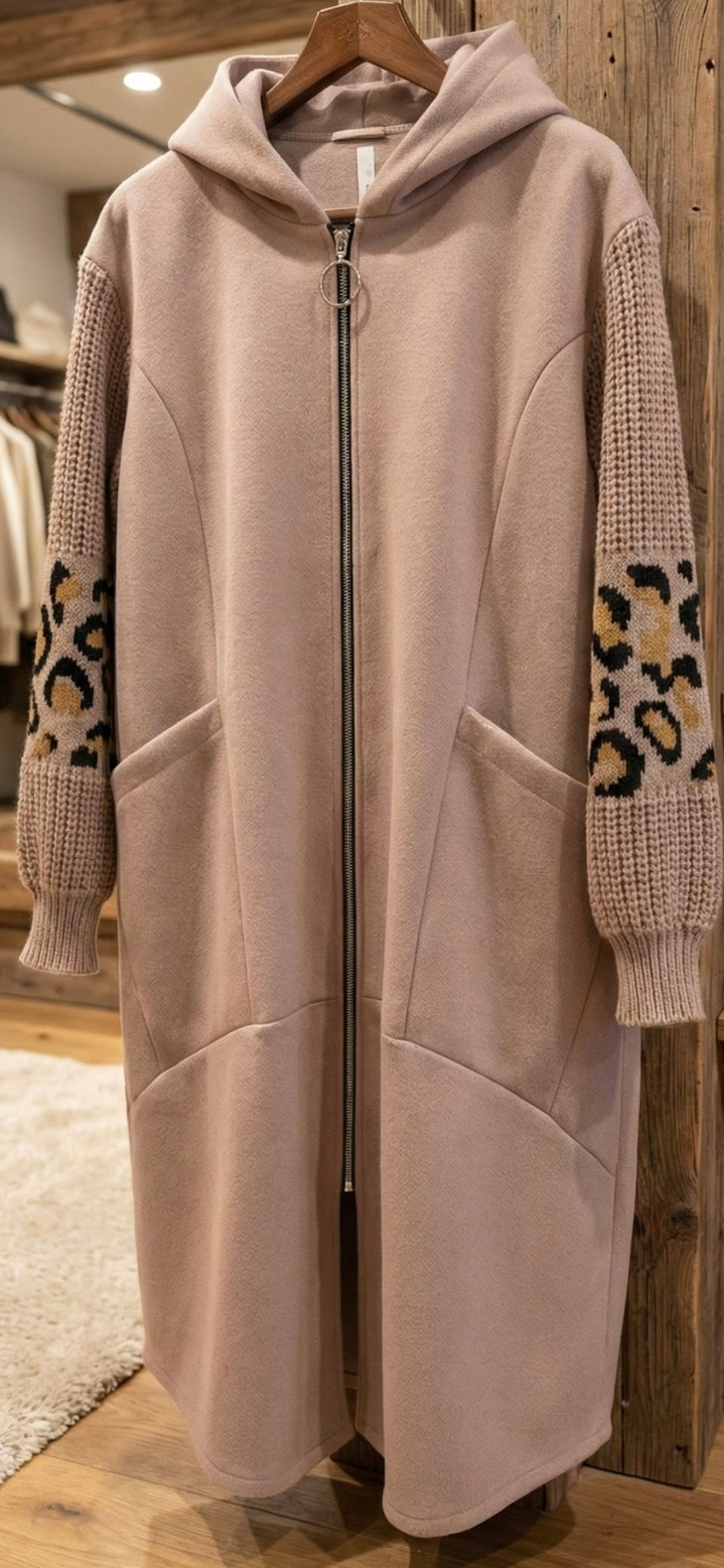 "Unique animal sleeves detail - close-up"