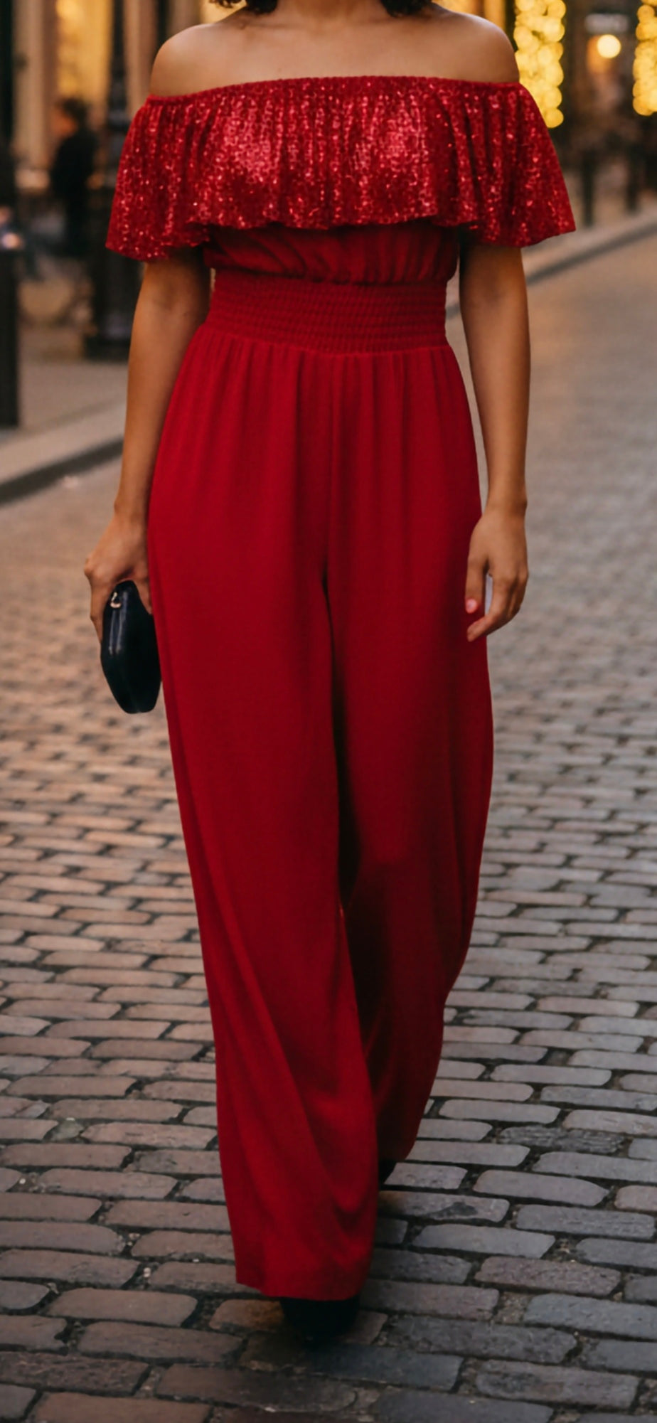 off-the-shoulder wide-leg jumpsuit with a sequin frill top and smocked waist